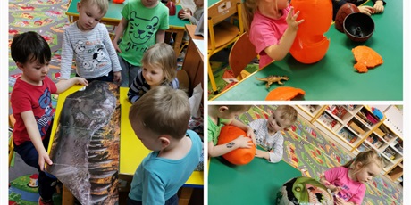 Powiększ grafikę: Dzieci skłądają jaja dinozaurów z części, Igor ogląda album z dinozaurami