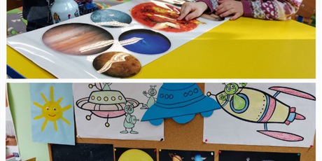 Powiększ grafikę: dzieci oglądają obrazki planet